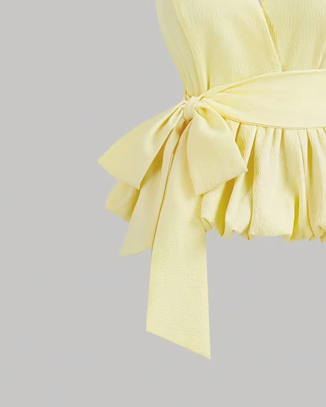 Halter Neck Ruffled Hem Sleeveless Top in French Vanilla - Image 3