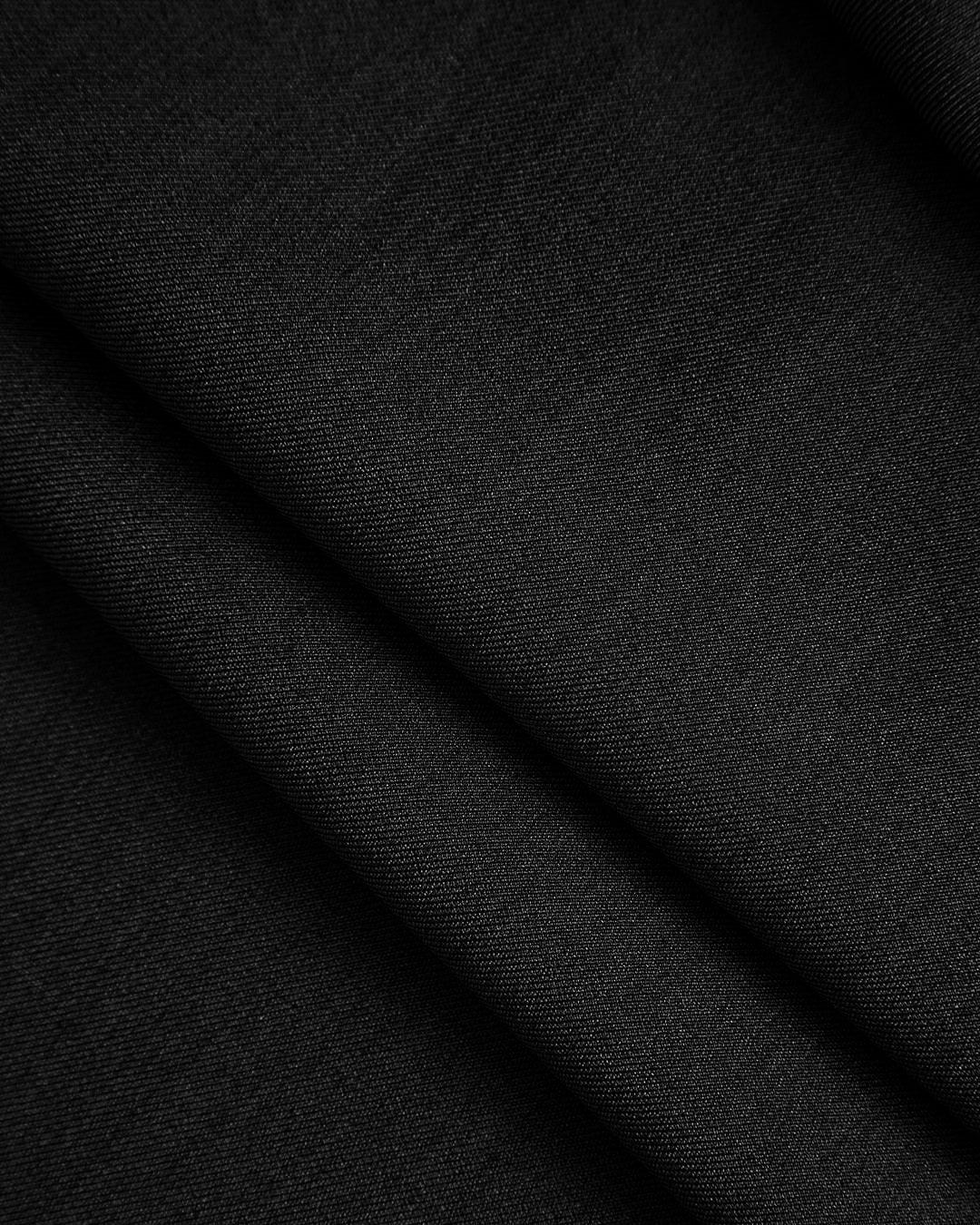 Solid Knot Asymmetrical Trousers In Black - Image 3